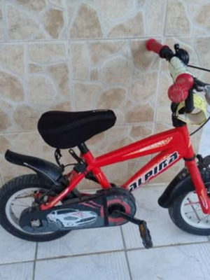 Alpina 14" children's bike used with training wheels, red
