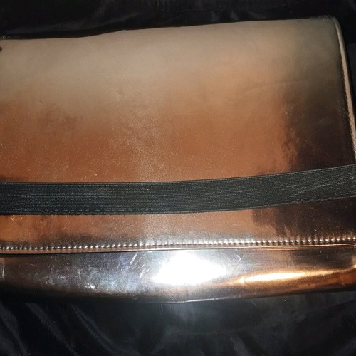 Pink Woman hand purse silver shiny clutch like new