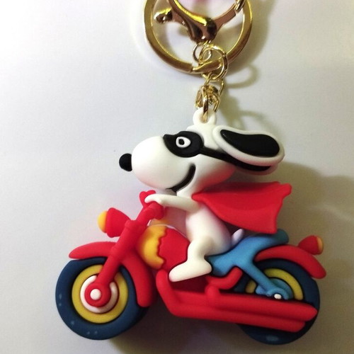 Snoopy figure on motorcycle new, collectible