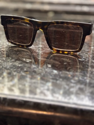 Prada sunglasses like new, unisex, black and brown