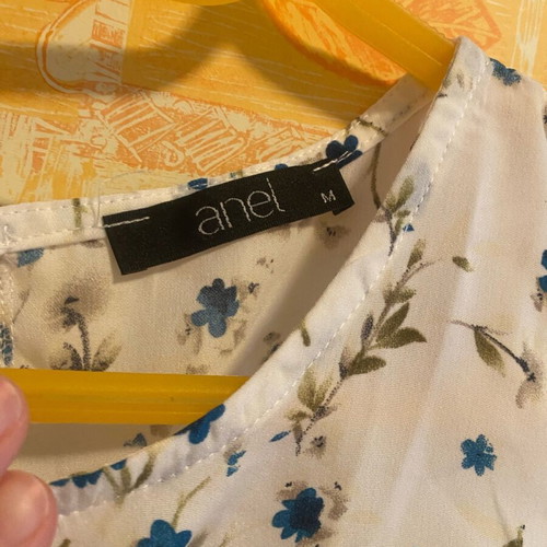 Anel blouse like new, medium size, white with shoulder cutouts