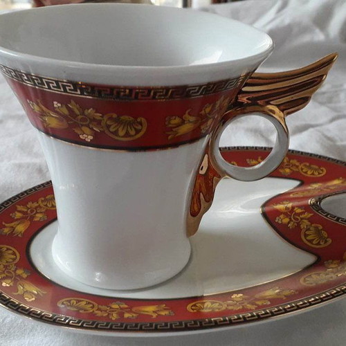 Pair of Limoges cups in white and red with gold and saucers new