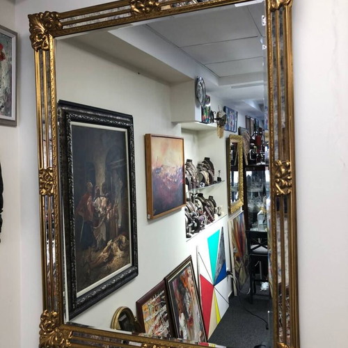 Large luxury wall mirror in baroque style used, ornate frame