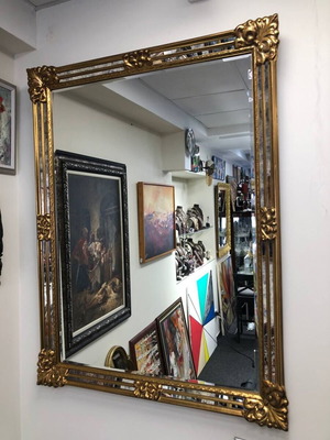 Large luxury wall mirror in baroque style used, ornate frame