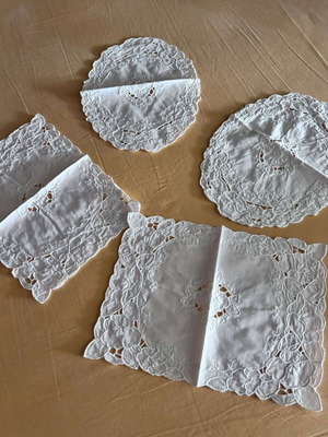 White napkins with cutwork design like new