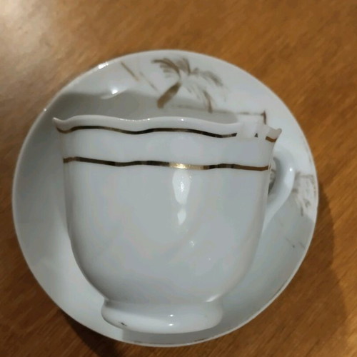 Collectible old coffee cup used from Japan with saucer