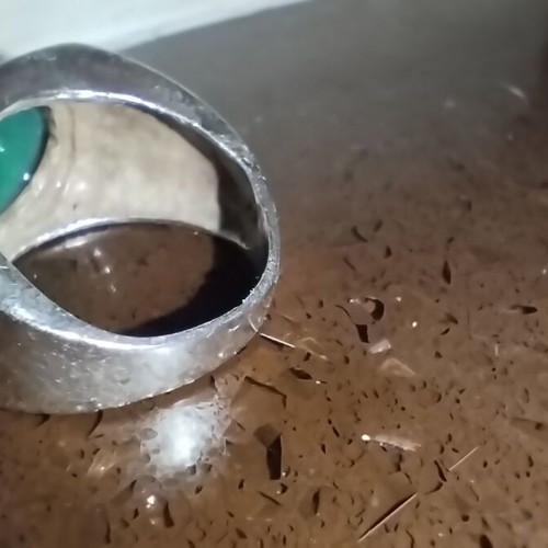 Sterling silver ring with green onyx cabochon used