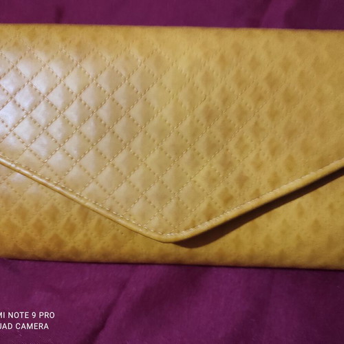 Women's mango yellow envelope bag with quilted surface and gold chain