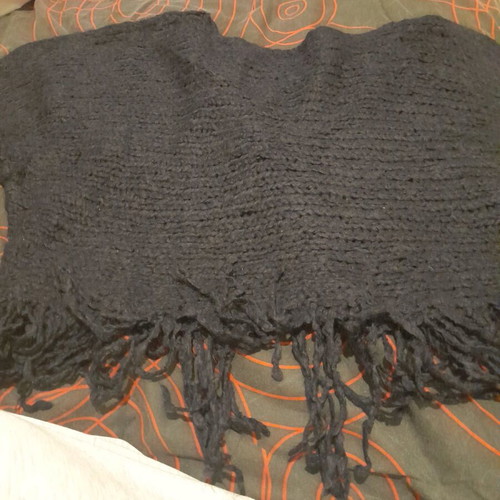 Black women's knitted top with fringes used