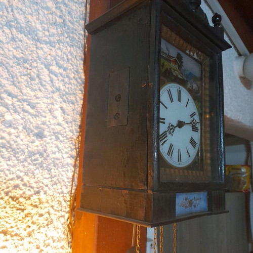 Pendulum clock type Chinoiserie from 1890 used with weights