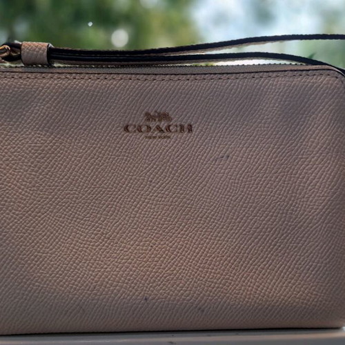 Coach wristlet bag used, beige with strap