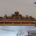 Wood-carved mirror like new, dimensions 95 × 60 cm