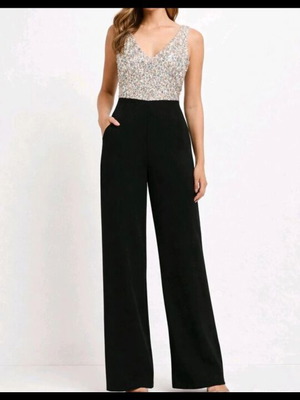 Jumpsuit official with sequins XL size, like new, black and silver