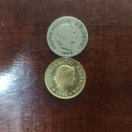Swiss coins like new, five-cent and 20 cent pieces