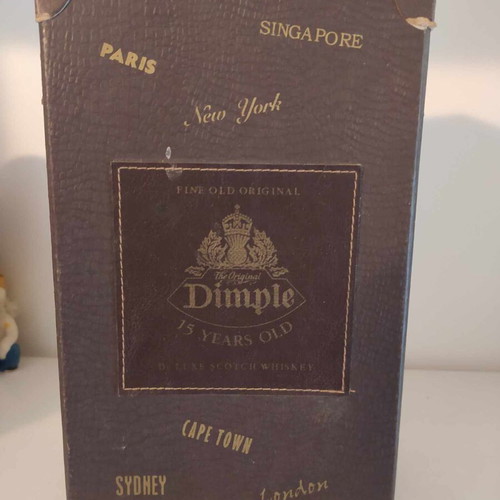 Dimple whiskey 15 years old box used, leather outside, paper inside