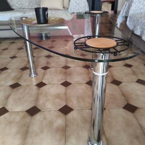 Glass coffee table with metal legs