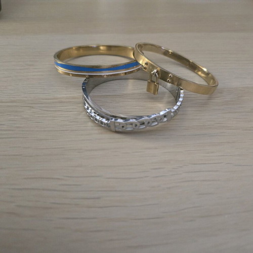 Stainless steel bracelets like new, set of 3, gold and silver colors