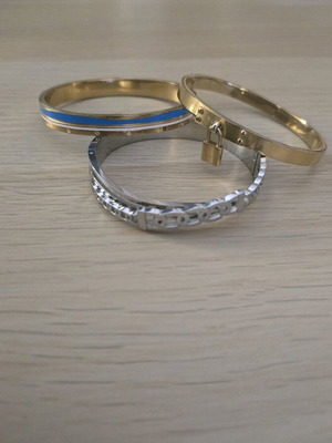 Stainless steel bracelets like new, set of 3, gold and silver colors