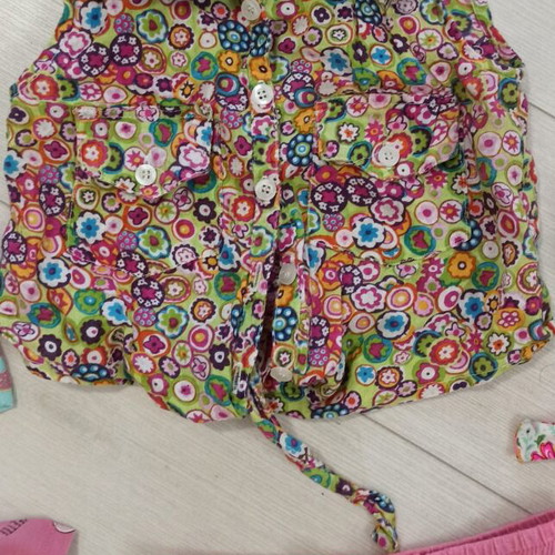 Baby clothing set like new, includes bikini, shirts, shorts up to 2 years