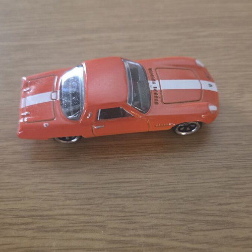 Hot Wheels 1968 Mazda Cosmo Sport orange racing line, like new