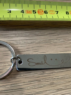 Keychain stainless steel Smile new, silver