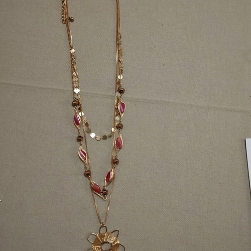 Triple necklace new with red stones and gold flower pendant