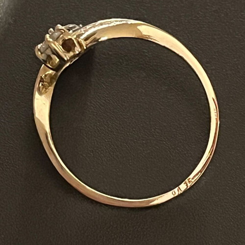 Women's 14K gold ring like new with round cut and pear-shape stones