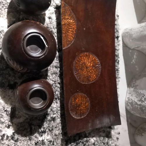 Plate with three wooden candlesticks used