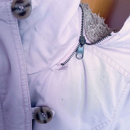 Winter jacket size 36 used, powder pink with brown stains