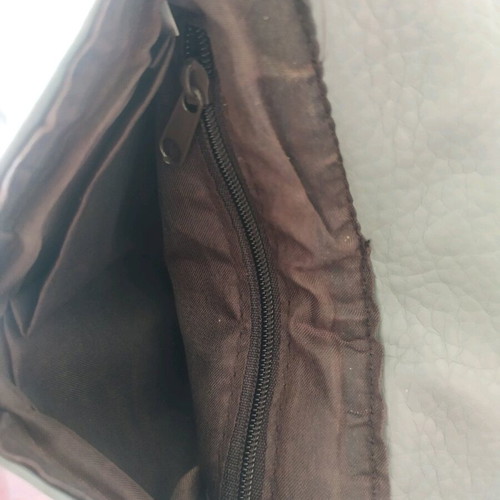 Gray crossbody bag like new with long strap and magnetic closure