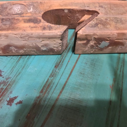 Wooden plane used with signs of wear, about 25 centimeters