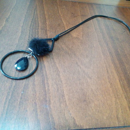 Black teardrop pendant with fur tassel on leather strap like new