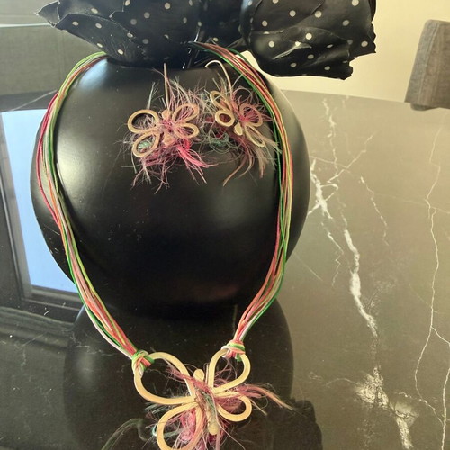 Handmade necklace and earrings set with butterfly and colorful fabric fibers