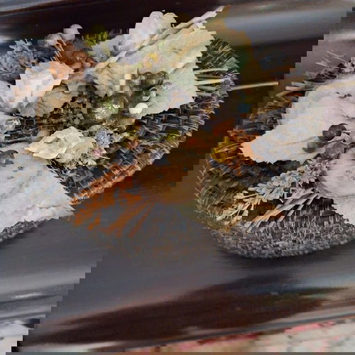 Καλάθι αποθήκευσης σαν καινούργιο με διάκοσμο σε πράσινο οβάλ σχήμα