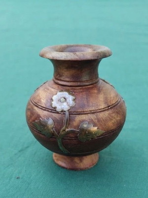 Decorative wooden turned vase with brass floral inlay
