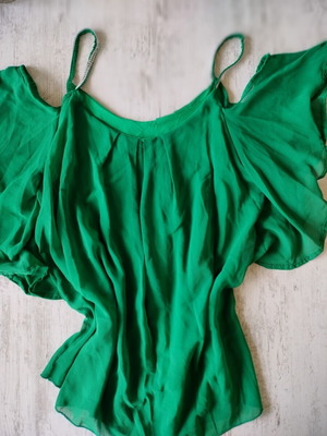 Green blouse with thin straps and stones like new, size L