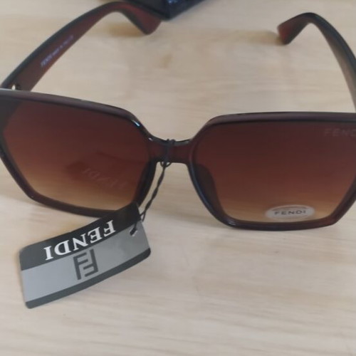 Fendi women's sunglasses new, brown with case