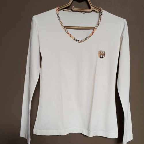 White women's long-sleeve blouse with classic checkered trim, like new
