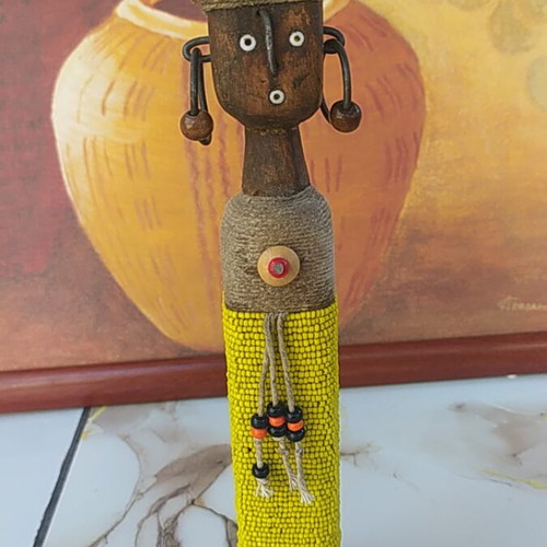 Namji African fertility doll handmade with wood, shells, cowrie, and yellow beads