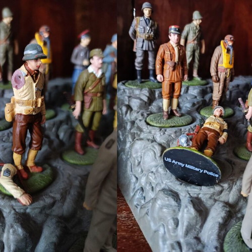 World War II Soldier Miniatures Collection like new, 37 pieces with stands and guide