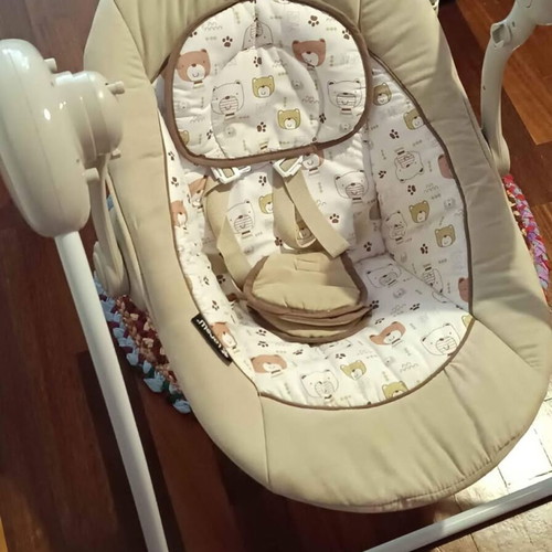 Electric baby bouncer used with music