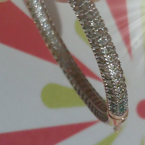Gold hoop earrings with zircon stones