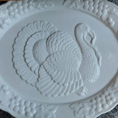 Large ceramic oval platter with embossed design like new