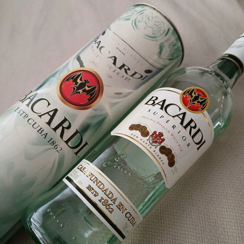 Pack of 2 old drinks, 1 vodka and 1 Bacardi, like new