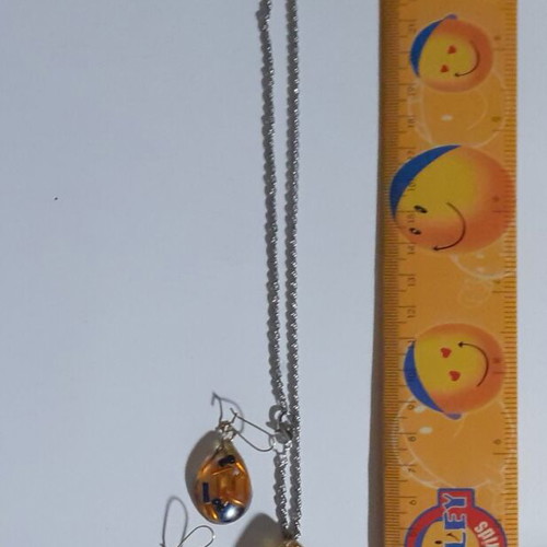 Set of 7 handmade pendant and earring jewelry sets with resin and dried herbs