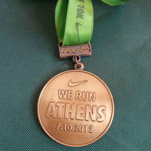 Nike We Run Athens 10K 2012 commemorative medal mint condition