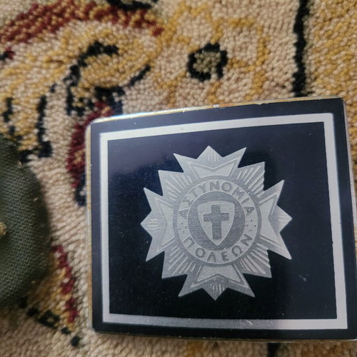 Set with Greek emblem and 2 police buckles used