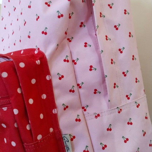 School bag used, pink with cherry and polka dot pattern