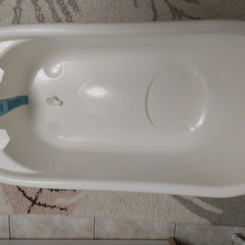 Bebe Stars bath tub used with thermometer and stand