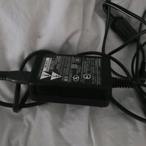 Sony V1 camera refurbished, for parts with charger